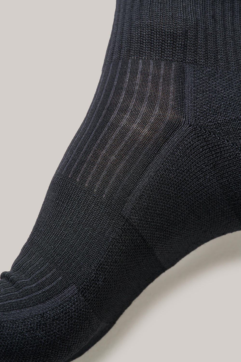 Compression band around the midfoot